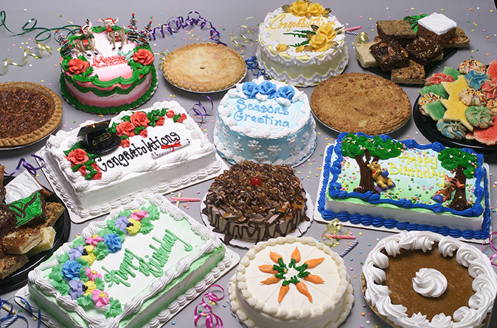 Decorated cakes on display in the bakery section at Super One Foods.