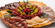 Meat and cheese platter with assorted deli meats and cheeses