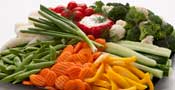 Vegetable platter with assorted fresh vegetables and dip